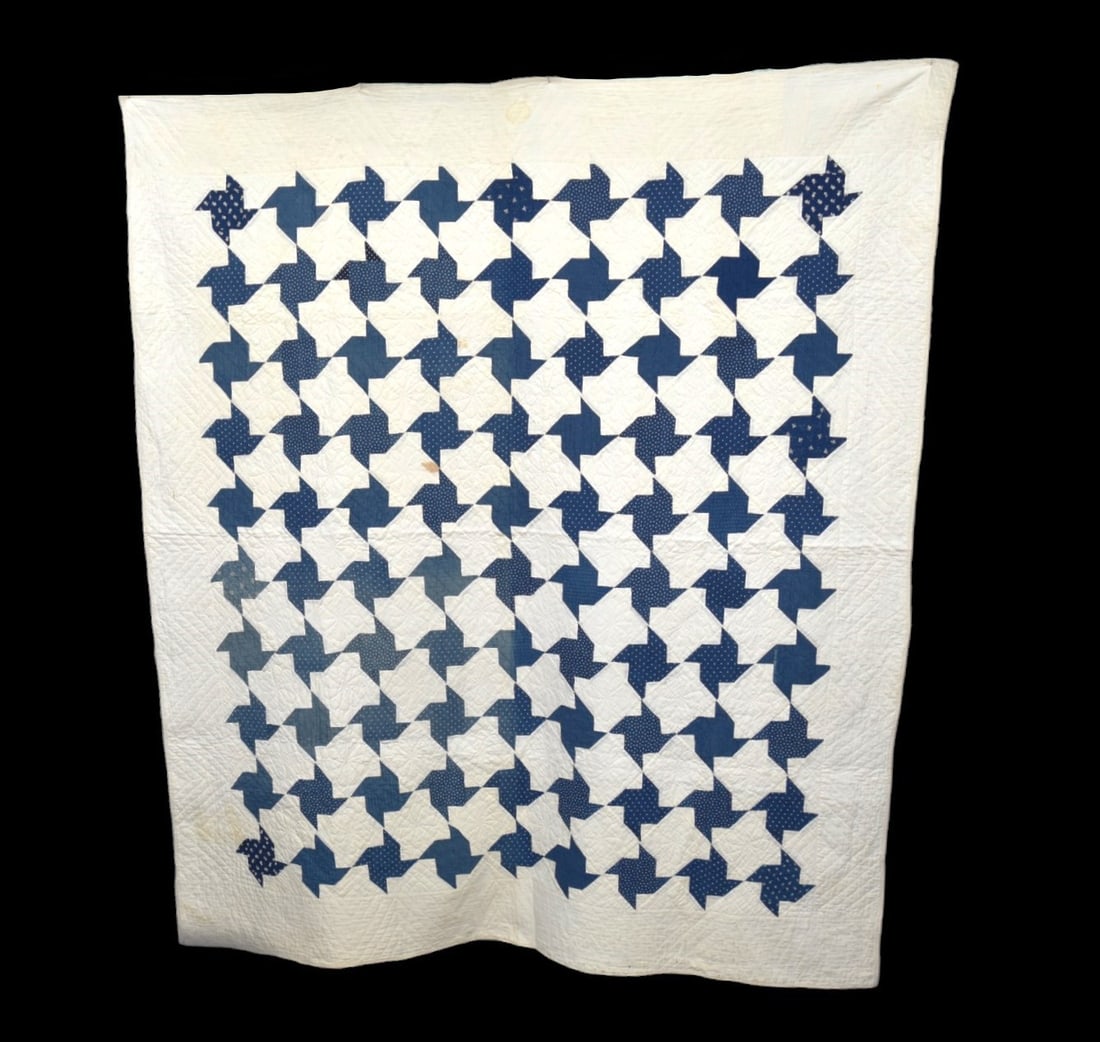 Early Germantown Ohio Pieced Quilt: Blue calico on white flying geese variant, all hand quilted, 66 x 78". Attached pencil manuscript note reading: Grandpa Klings mother, Malinda Kline made this & gave it t Grandma Kline when she marrie