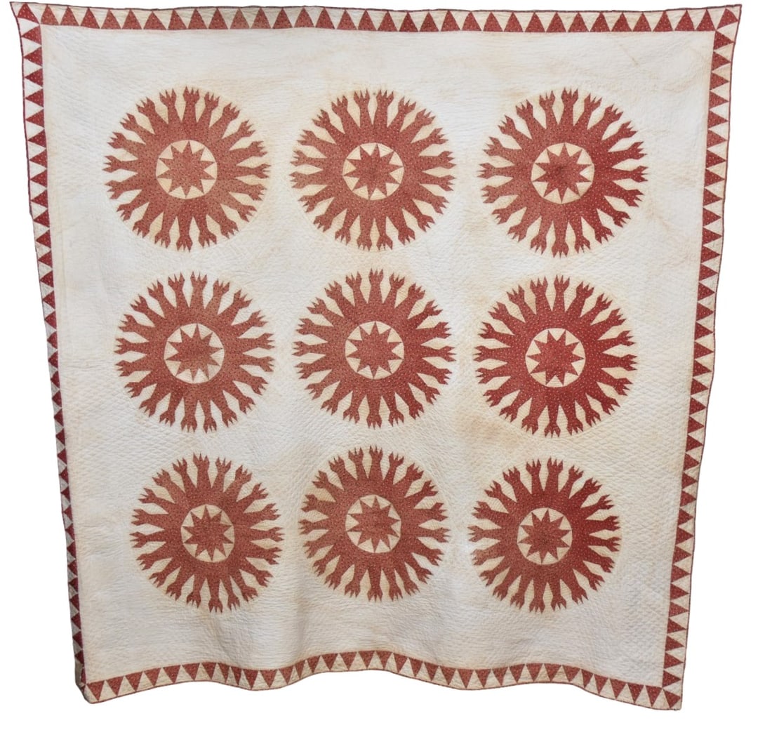 Outstanding Documented Early Pieced Quilt: Red calico three rows of three compass star variant, entitled Crown of Thorns, Tongs of Fire on white ground with saw-tooth edging, very fine diamond quilted ground with compass stars in ring quilting