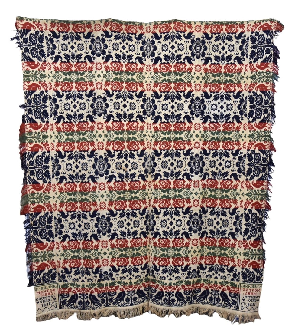 1838 Montgomery Co. Ohio Jacquard Coverlet: Signed in upper corner blocks W. Shank Montgomery County Ohio 1838 in four colors, navy blue, green, red & white, woven in two pieces, with bird and rose bush border and roses on interior, 80 x 87". C