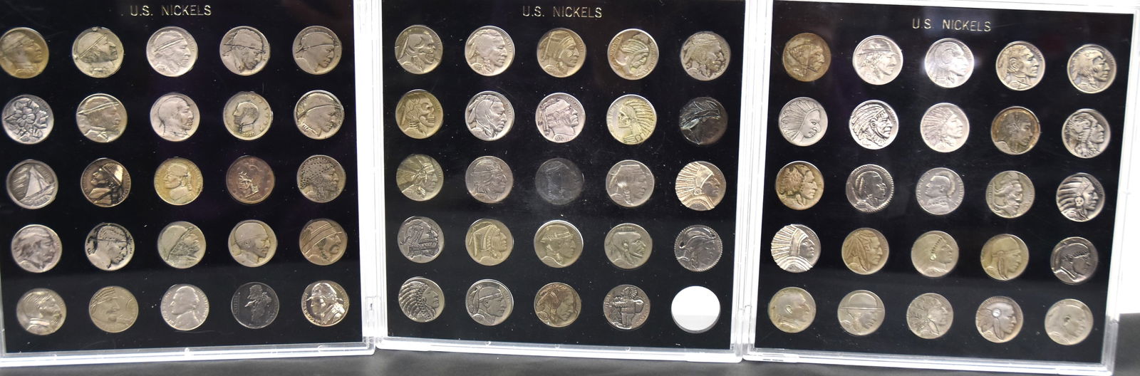 Large Group of Carved Hobo Nickles: Lot of 74, including both nickels carved in the early 20 th century and some done on old Buffalo nickels and more modern nickels. Many of the new carved Buffalo Nickels are signed by the artist on the