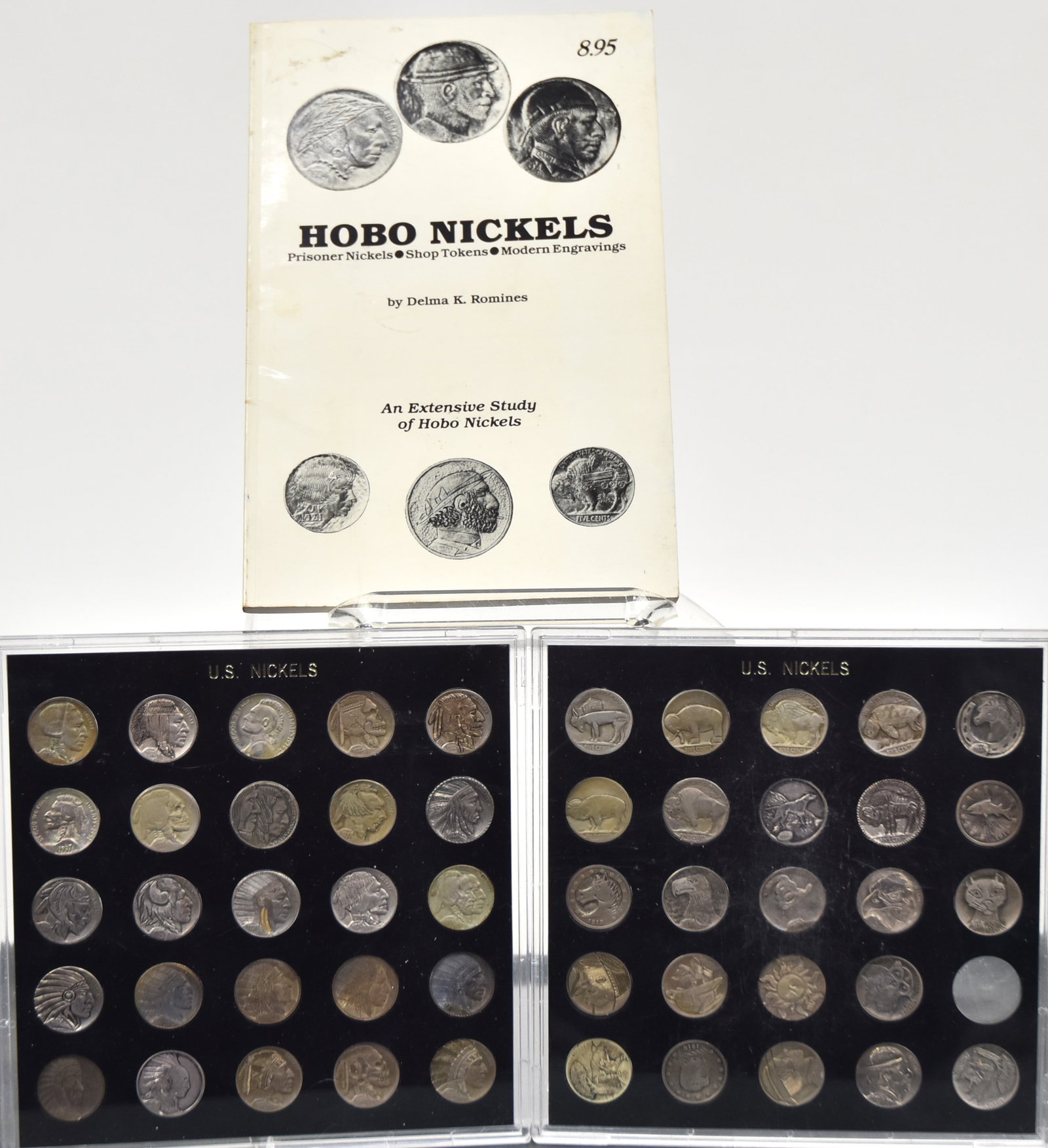 Large Group of Carved Hobo Nickels Plus: Lot of 49 nickels and one book on Hobo Nickels by Delma K. Romines, 1982, autographed by author. The nickels include some fine examples of the work of Bo, the African American carved from Mississippi,