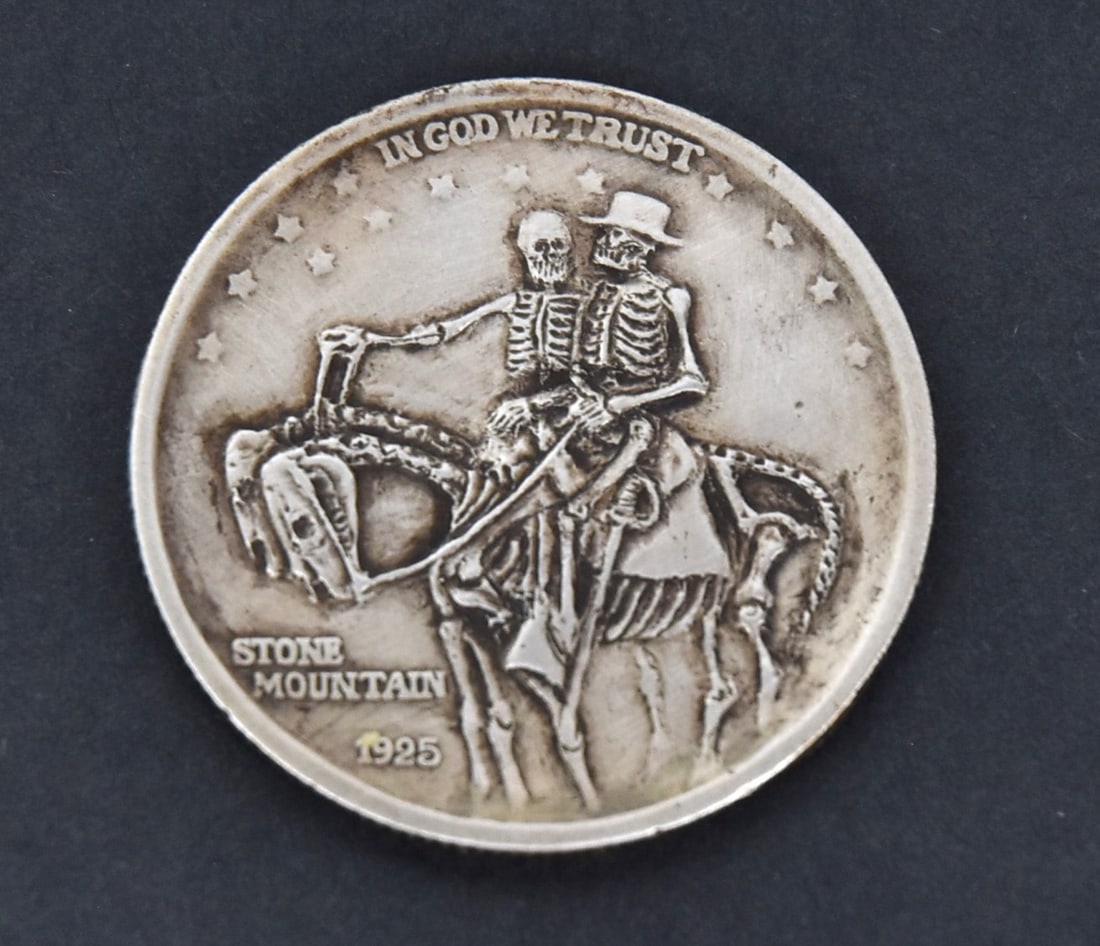 Hobo Half Dollar: Made from U.S. silver Stone Mountain commemorative 1925 half dollar with obverse relief mounted portrait of Lee & Jackson carved as skeletons, including horses. Condition circulated, VG+.