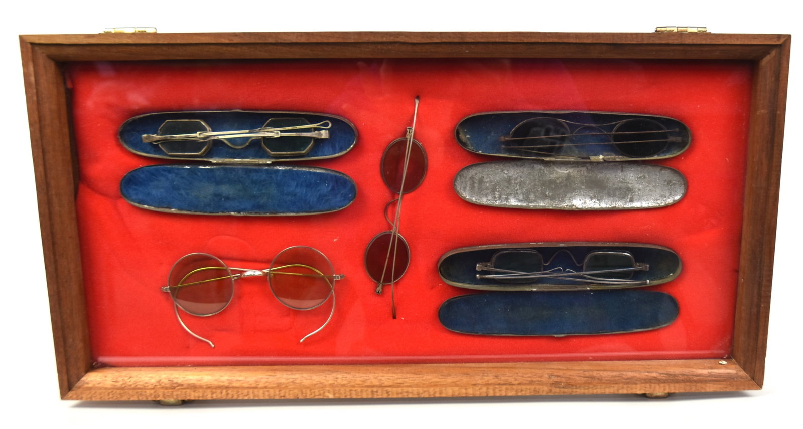 Civil War Sharp Shooters Sunglasses Plus: Lot of three in original tin velvet lined cases, two of which have folding side glass pieces to eliminate glare from the side, both in green with nickle frames and adjustable sliding/folding sides, 5 