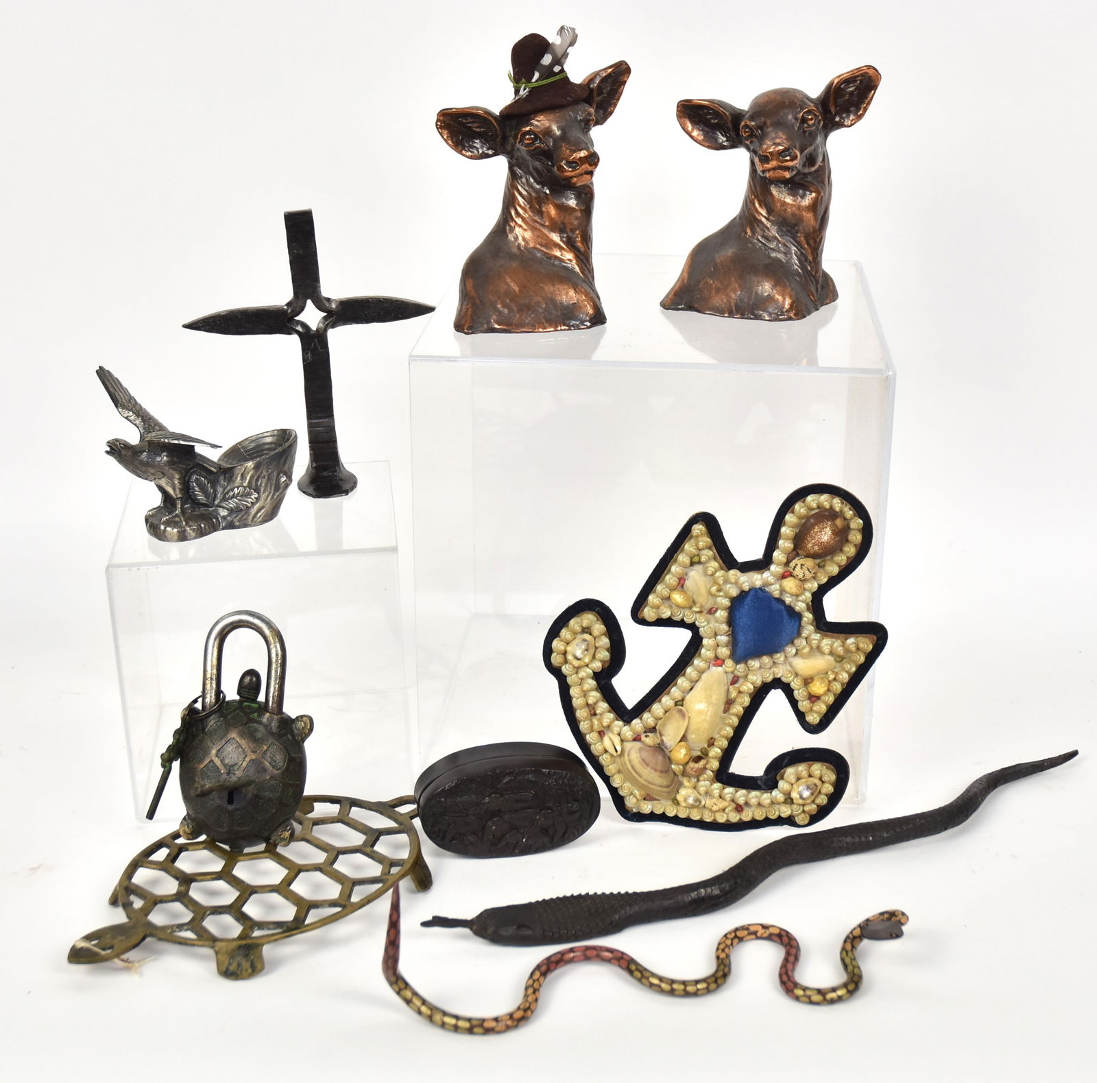 Metalware Plus: Lot of nine, including a pair of copper plated marked Kraftware doe head bookends, 5 1/2" high; plus wrought steel snake made from an old steel file, 17" long; plus polychrome painted hand wrought ste