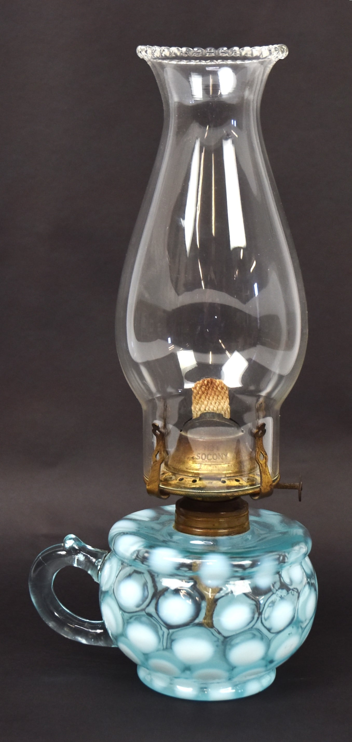 Sapphire Coin Spot Oil Lamp: Finger lamp with applied scrolled handle, brass burner marked No. 1 Socony and clear glass chimney, 5 x4 x11 1/2" high. Condition Fine.