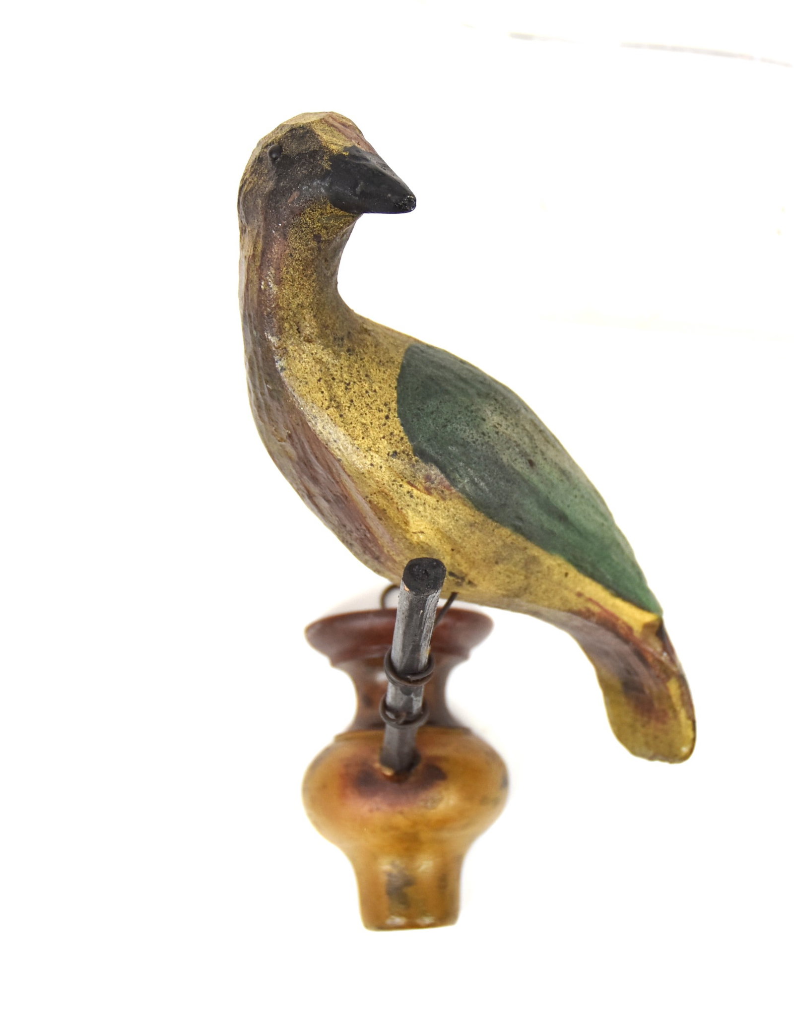 Painted Wood Folk Art Bird on Branch: Polychrome painted with yellow body, green wings and red, black & white tail, wood bead eyes, perched on twig branch and with half turned wood wall mount in red & yellow paint, nice old patina, 7 x5 x