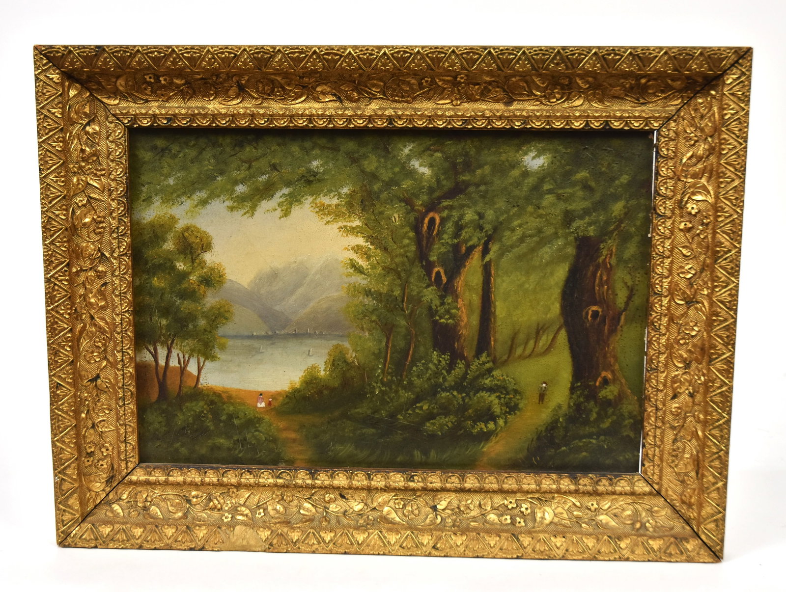 Hudson River Folk Art Landscape Painting: Anonymous oil on board with sail boats on river, three figures and mountains in distance, 12 x 8 1/2" high in period gold leaf frame, 15 3/4 x 11 1/2" high. Condition VG+.