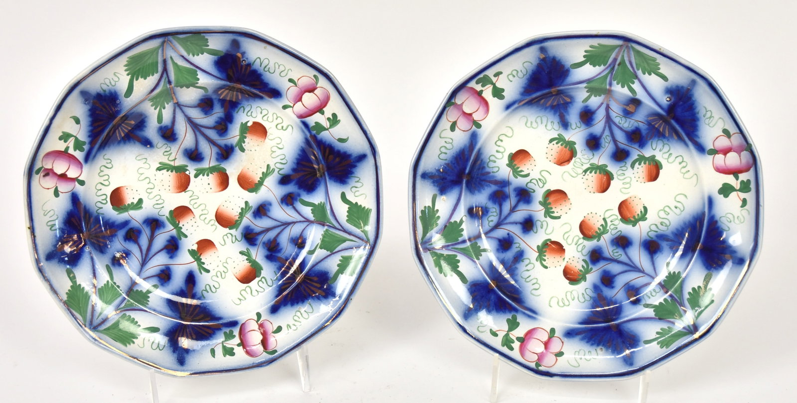 Gaudy Ironstone Plates: Lot of two strawberry pattern, unmarked, 8 1/2" diameter. Condition stains on back of one, else VG.