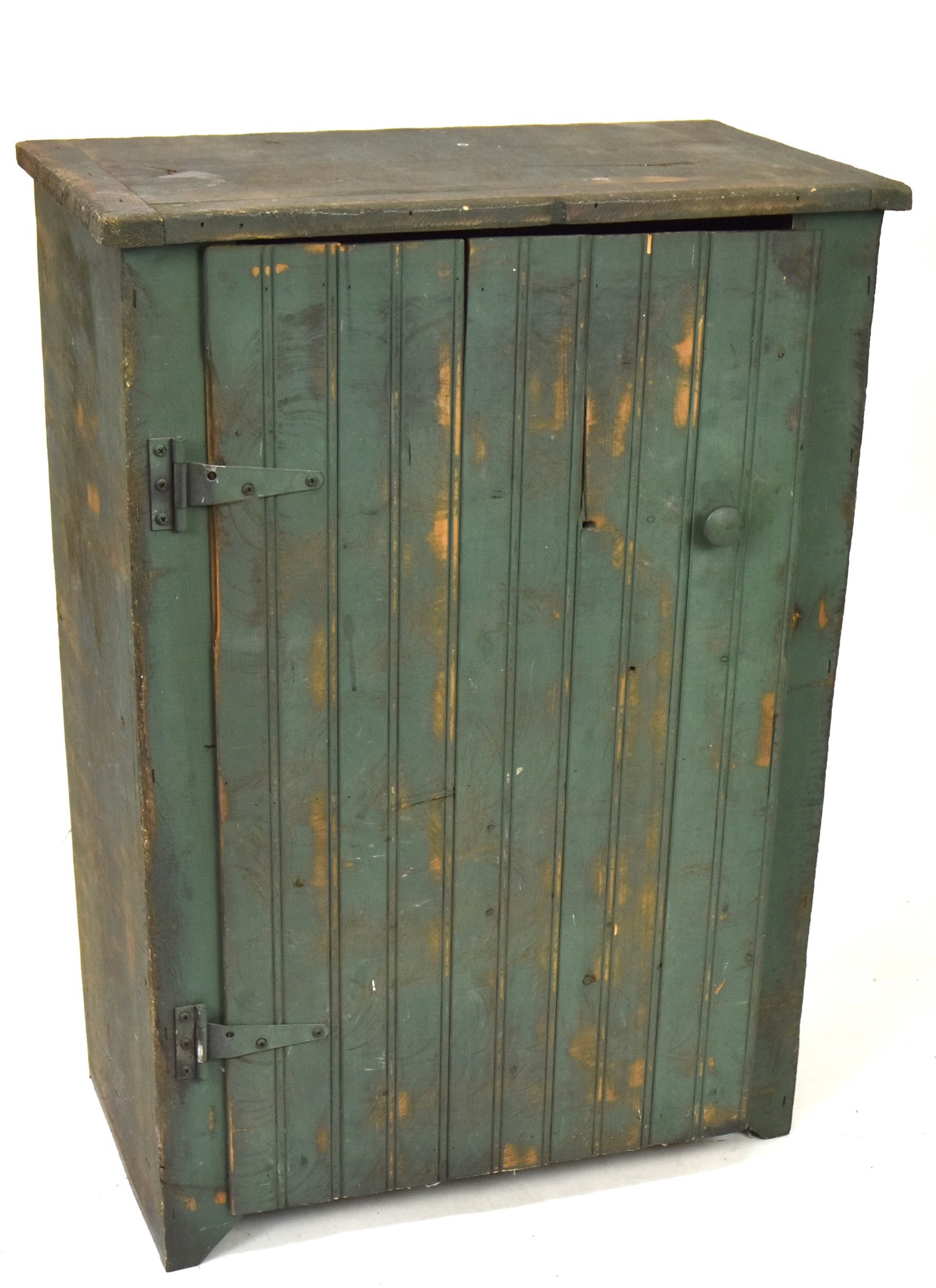 Small Green Painted Cupboard: Circa 1910 in white pine with ovr hanging top with bread board ends, over single door, solid ends in original green painted finish, two interior shelves, 23 1/4 x 13 x 33" high. Condition paint circa 