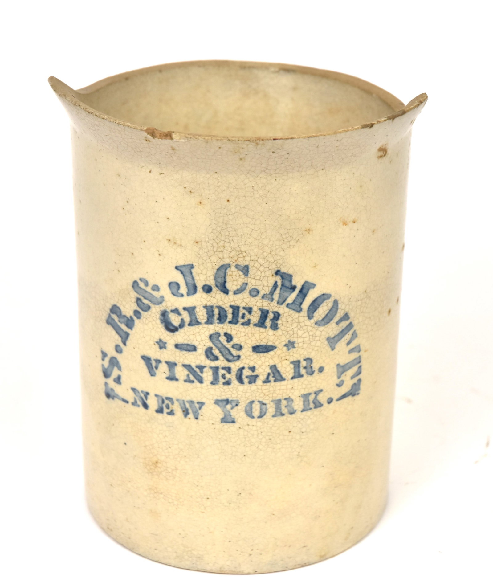 S.R. & J.C. Mott New York Cider Stoneware Pitcher: White glazed stoneware with cobalt stenciled as above and & Vinegar. New York, with molded handle, 6 1/2 x 6 x 7 7/8" high. Condition small chips on spout, still VG.