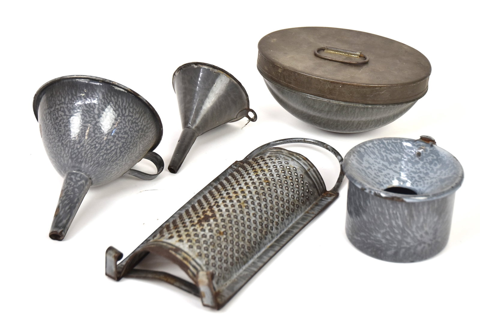 Gray Graniteware Kitchen Items: Lot of five, all late 19th or early 20th century,in mottled gray enamel, including two funnels, 5 1/4" diameter x 6" high & 3 3/4" diameter x 4 3/4" high; plus hand held spittoon with hinged lid, 4 1/