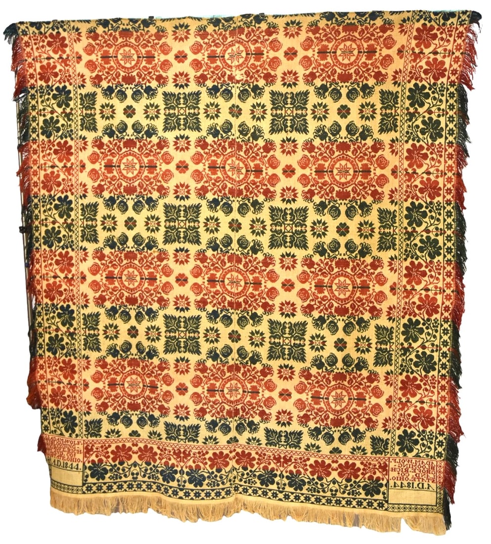 1844 Adam Blooming Ohio Jacquard Coverlet: Three color signed and dated in two corner blocks reading: Adam Wolf Blooming Grove Richland Co. State Ohio A.D. 1844, floral pattern, 73 x 84" less fringe. Condition VG+.