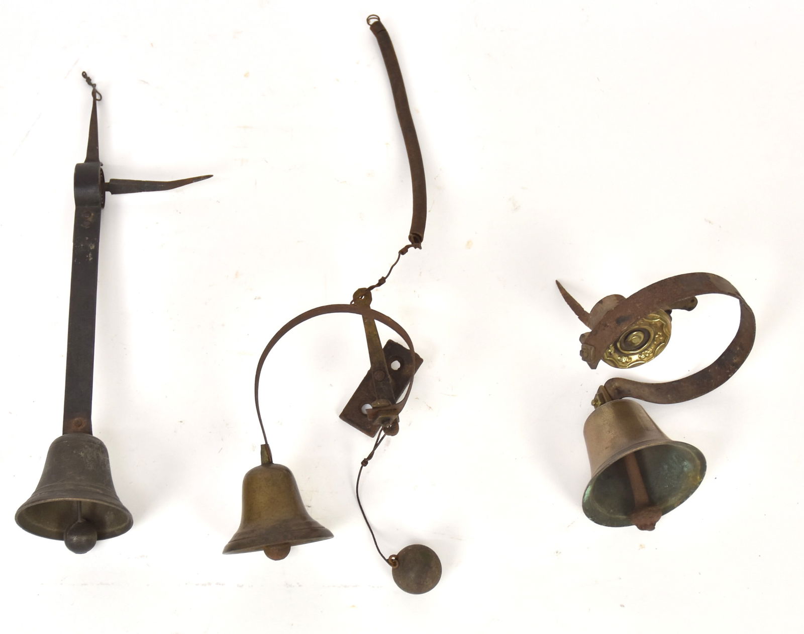 Three Early Brass & Iron Shop Doorbells: Each with cast brass or bronze bell with wrought iron mounts, bells are 2 3/4" & 3 1/4" diameter. Condition All working VG.