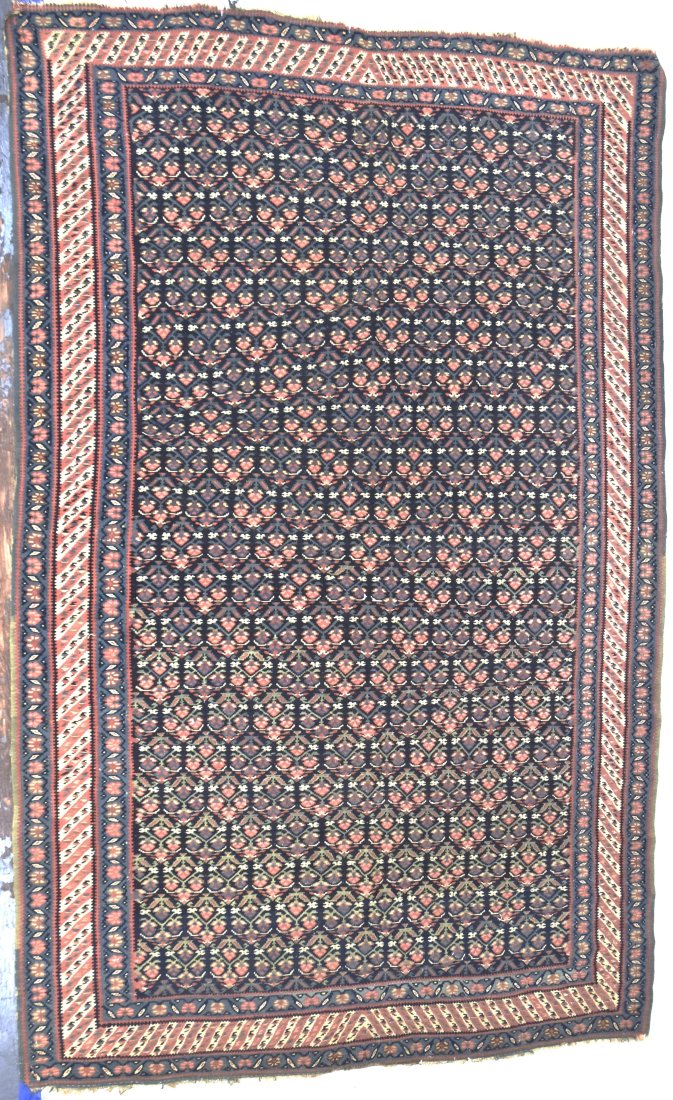 Antique Tribal Area Rug: All over repeating floral pattern with three borders, Kilim type woven borders, 55 x 85". Condition minor wear at ends VG+.
