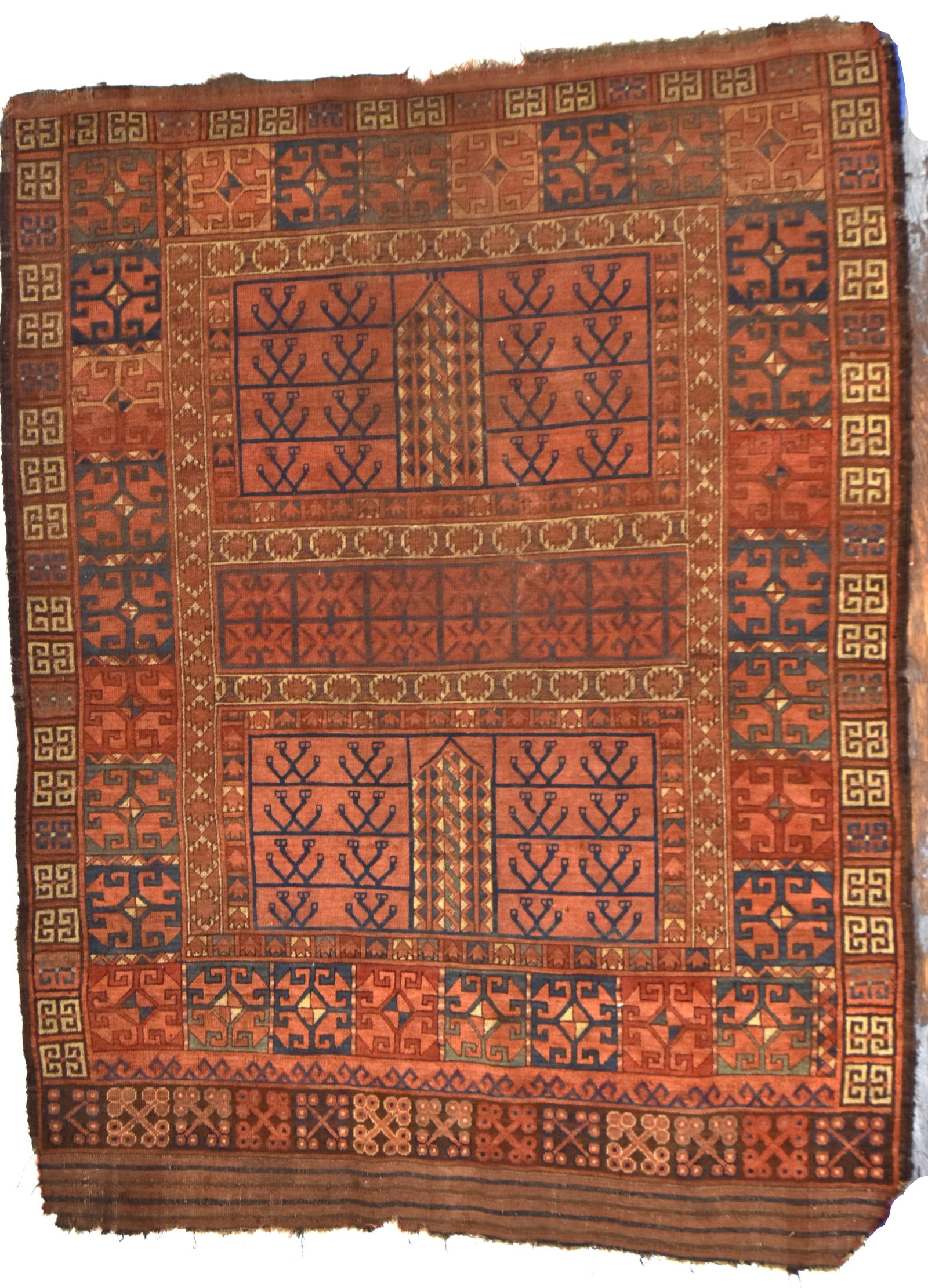 Antique Tribal Area Rug: Four blocks of repeating geometric patterns with two borders, red field, 55 x70". Condition wear at ends VG.