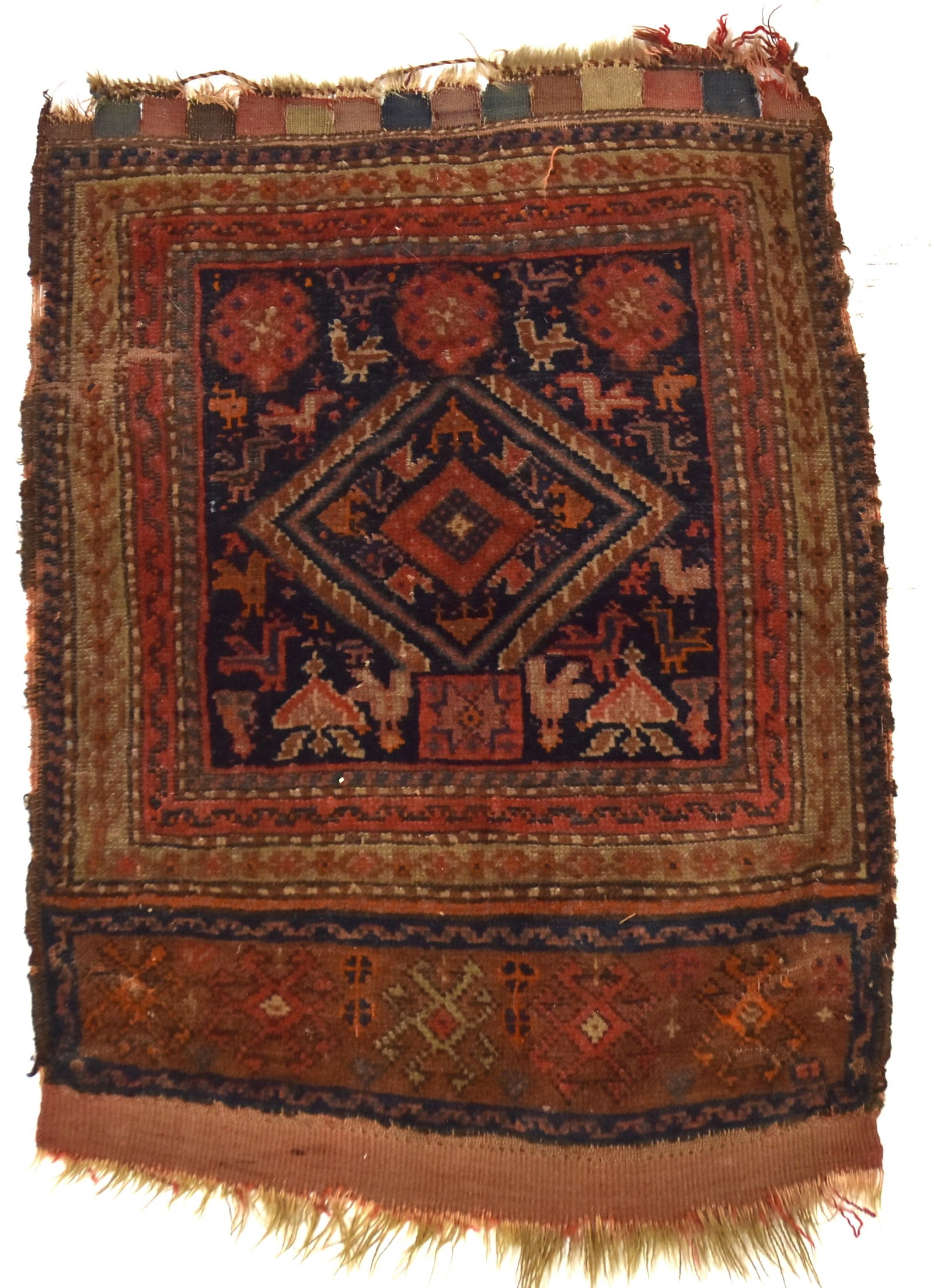 Antique Tribal Saddle Bag Face: Floral & geometric pattern 19 x 26". Condition moderate wear and short tears or seam breaks