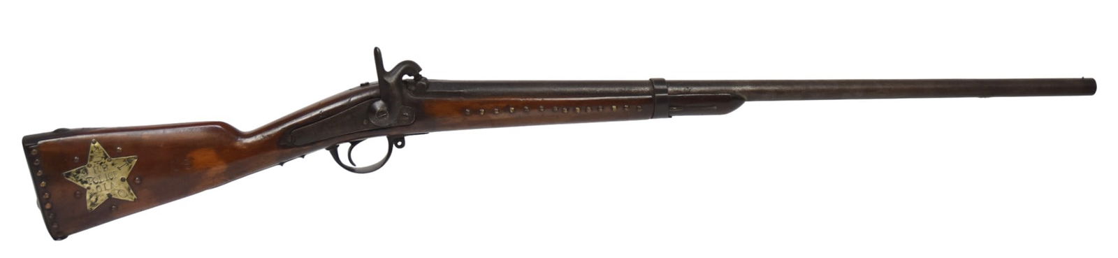 1889 U.S. Native American Police Rifle: Percussion 1841 Belgium made musket, with 33" long round barrel with front bead sight, walnut half stock, cut down from full in the 19th century, decorated with brass tacks and stamped on left side of