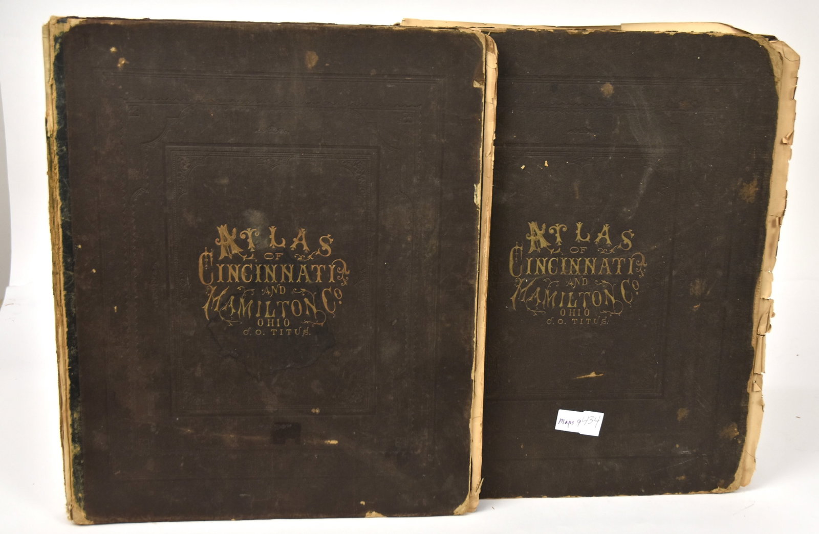 Two 1869 Cincinnati & Hamilton Co. Titus Atlas: Both Folio in black embossed buckram boards, one with 115pp and one with 95pp. Condition both need rebinding and damage to some maps, others missing from one,