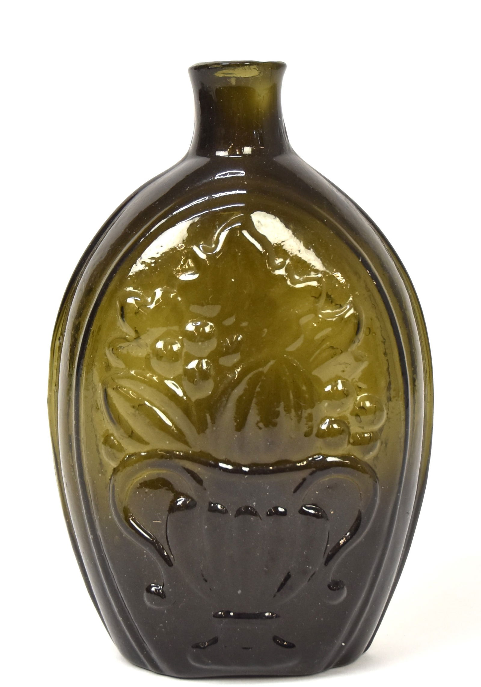 Deep Olive Green Cornucopia & Urn Flask: Flat sided with cornucopia with fruit on one face and handled urn with fruit and leaves on the reverse, fire polished lip an snap pontil, 4 1/2 x 2 1/4 x 7" high. Condition Fine.