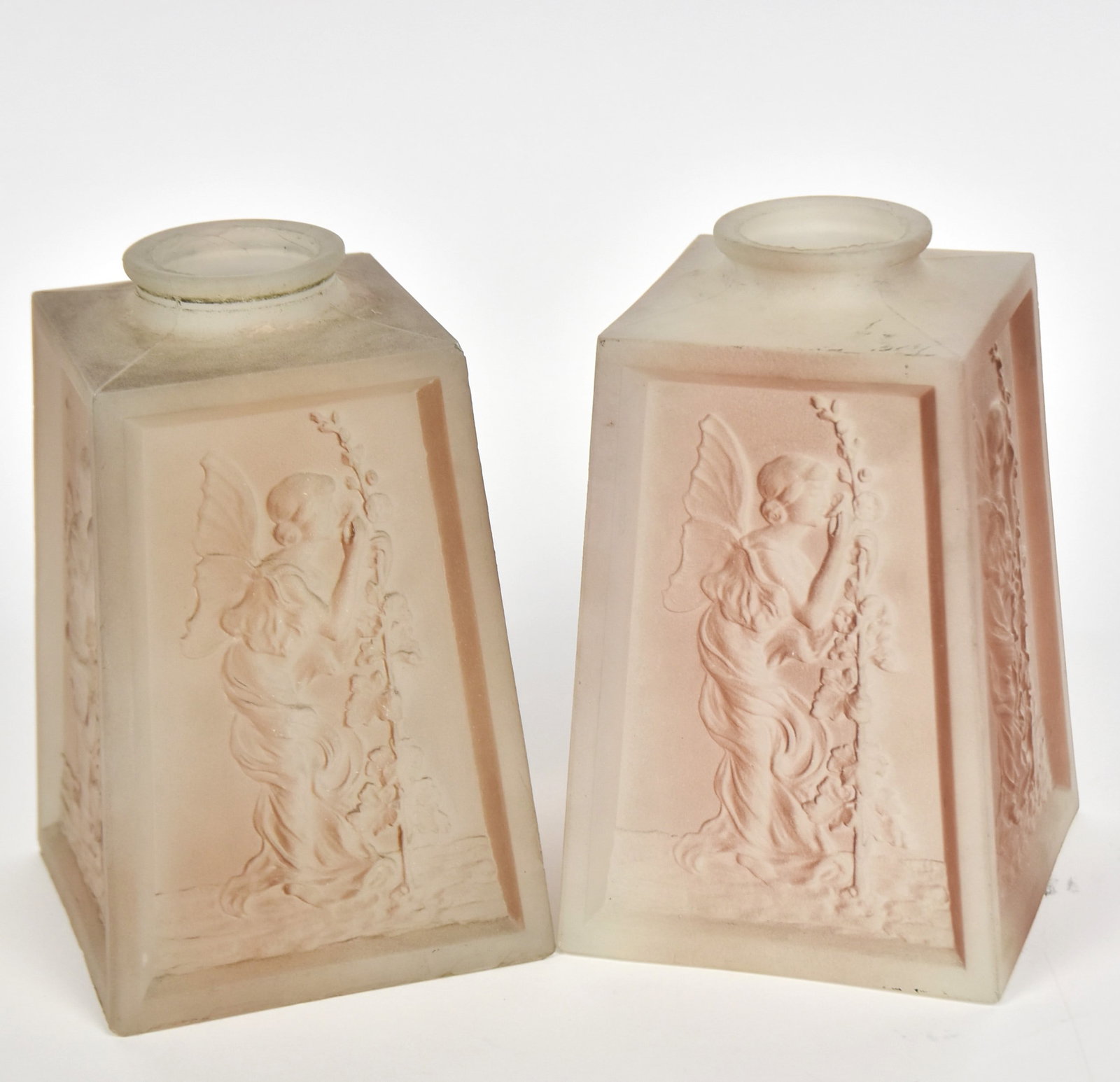 Pair of Arts & Crafts Glass Shades: Frosted cambroth with red tint shading, high relief of fairies with flowers, 4 3/4" square x 7 1/2" high x 2 1/4" collar. Condition paint on top, easily removed, VG.