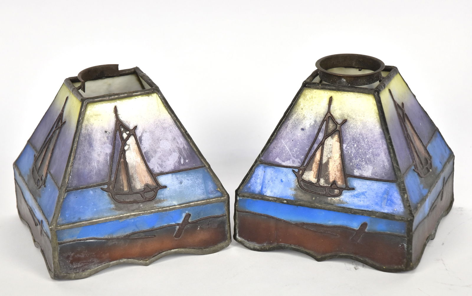 Pair Arts & Crafts Leaded Glass Shades: With schooner type sail boats on each side, 6 1/4" square x 6" high x collar 2 1/4" diameter. Condition one collar needs repair