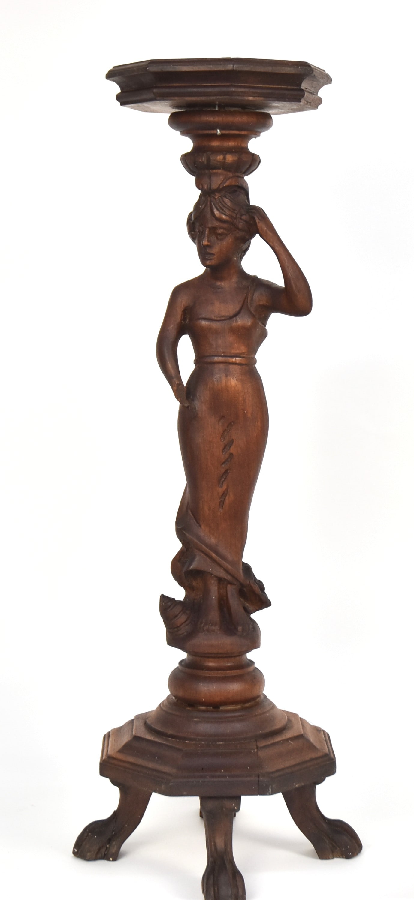 Walnut Figural Lamp Stand: With claw feet. Circa 1910. 26 1/2" H. Minus one hand but otherwise good condition.