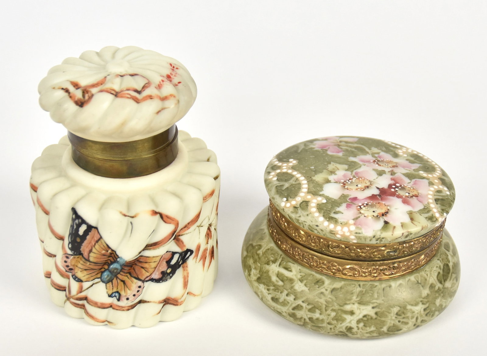Kelva Dresser Box & Inkwell: Wild roses adorned by enamel beading against avocado. 3 1/2”T. 4 1/2”D. Kelva Trade Mark logo. Baccarat attributed covered inkwell, enameled butterfly. Glass insert. 4 3/4”T. 3 1/2&r