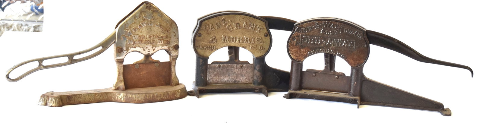 Three Tobacco Plug Cutters: Park & Grant, Fargo, ND. Chip -A- Way tool. WE & WG Jordan Minneapolis, MN. Some wear. 15 X 8.