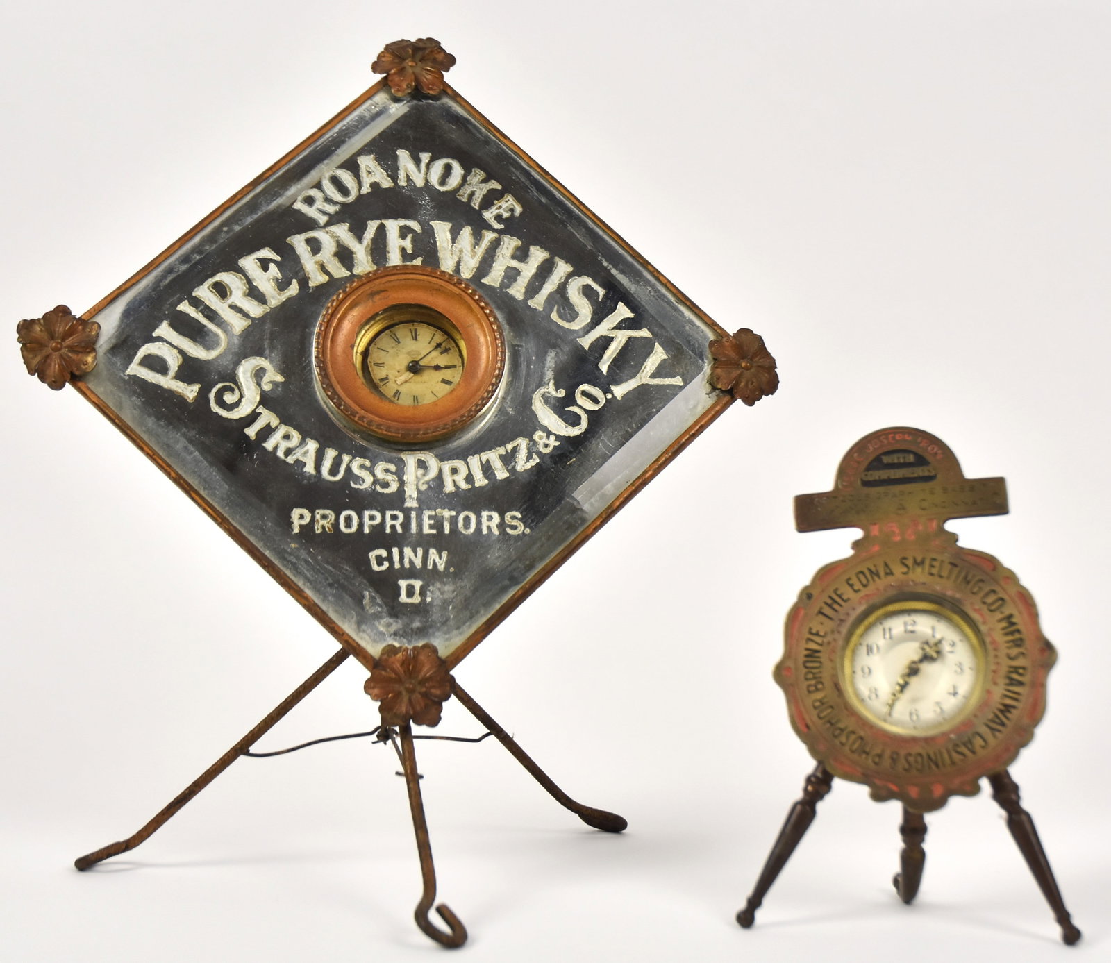Strauss Fritz & Co Cin, OH Clock Plus: Includes Roanoke Pure Rye Whisky mirrored clock & Edna Smelting Co. Cin, OH. Brass clock. 15" H x 12 x 8H.