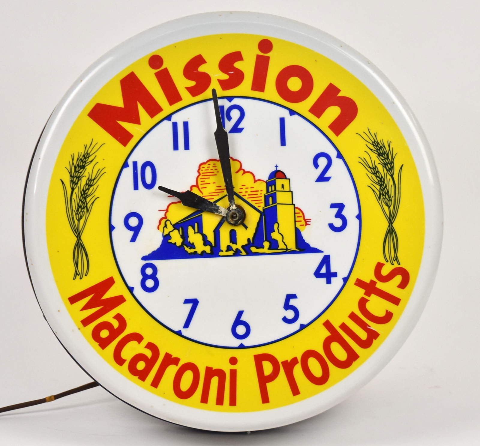 Mission Macaroni Products Clock: Plastic with metal frame. Not working. 14 1/2" dia. Good condition.
