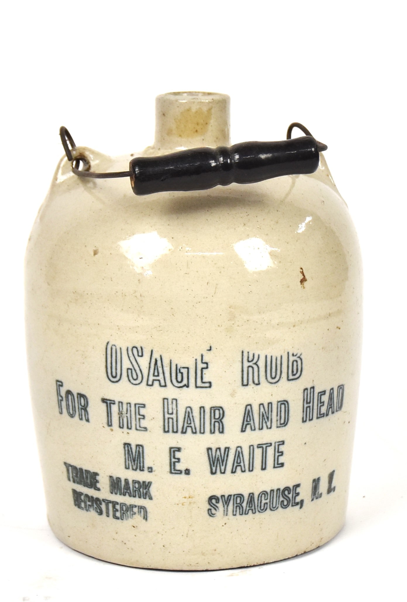Osage Rub for The Hair and Head Stoneware Jar.: M.E. Waite Syracuse, NY. 9 3/4" without bail. Good condition.