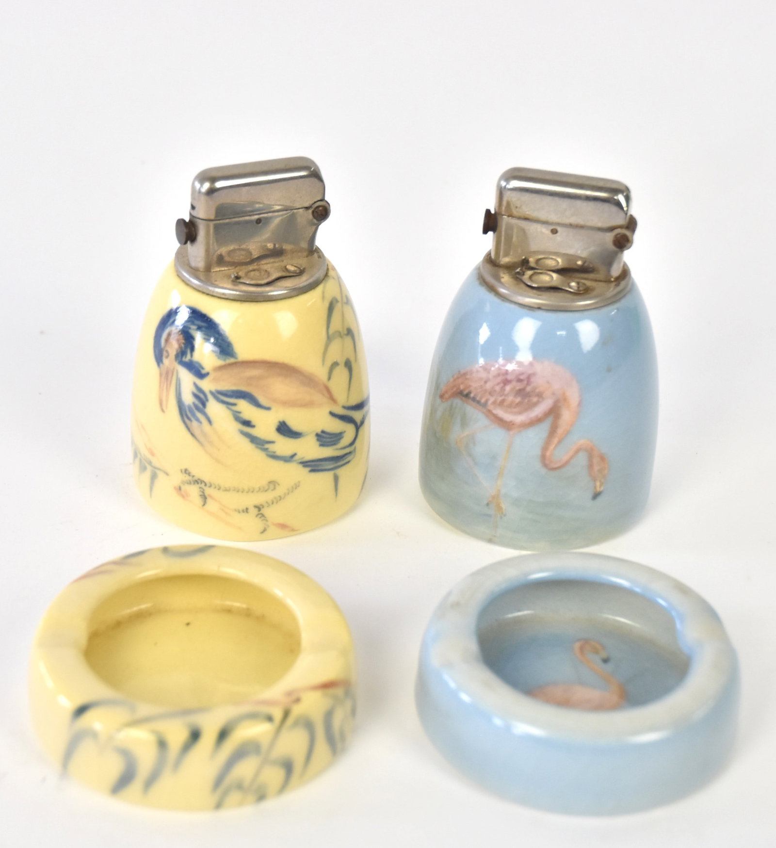 Two Rookwood Artist Signed Lighter & Ashtray: Each decorated with Birds. Blue -1946. Yellow -1946. Blue lighter has line. Other good condition. Lighter 4".