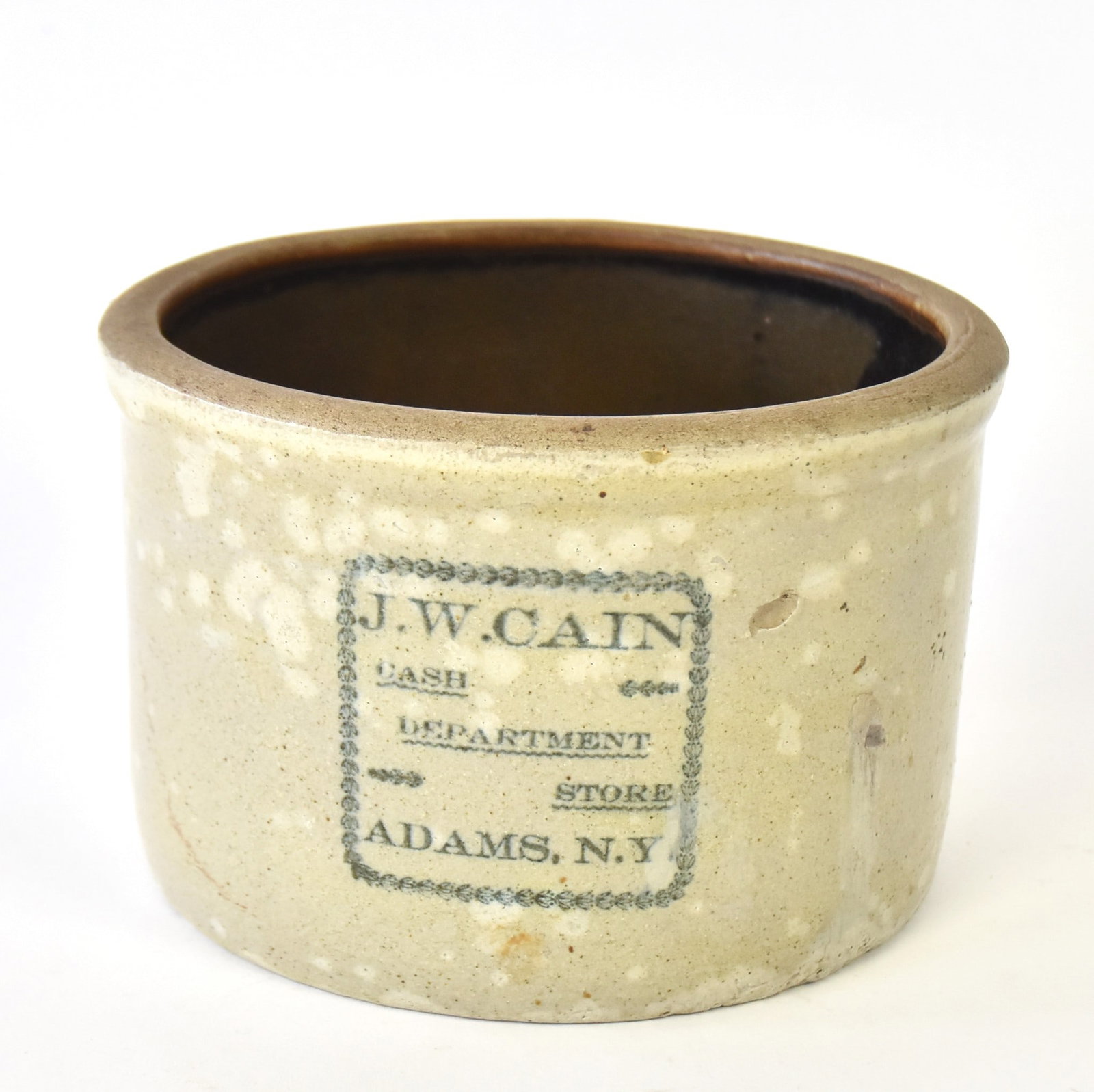 J.W. Cain Adams NY Stoneware Crock: Cash department store. 4 3/4 L x 7 1/4. Some discoloration otherwise good condition.