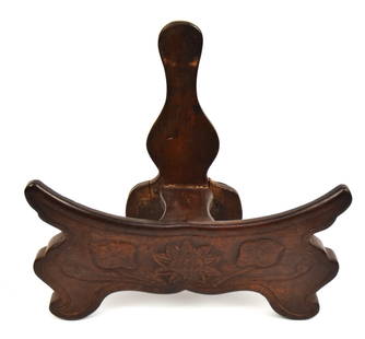 Fine Chinese Carved Charger Stand: Circa 1820-1850, in mahogany with relief carved lotus leaves and flower on front with mortised construction and early iron plates added to rear foot for repaired cracks, nice old patina, made for circ