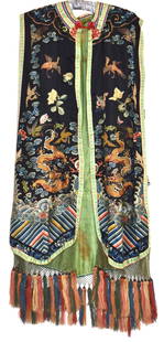 Chinese Embroidered Silk Ladies Robe Vest: 19th century with black silk ground and polychrome embroidery of clouds, phoenix, two beautiful dragons and flowers, considerable gold and silver thread, green patterned silk liner and polychrome