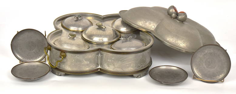 Qing Dynasty Chinese Pewter Chaoyang Sweetmeat Warmer: Circa 1890-1900, with lidded four lobed warmer that opens to reveal five lidded compartments for sweetmeats, each with dark or light green jade set in handles of lids, each in the form of a different