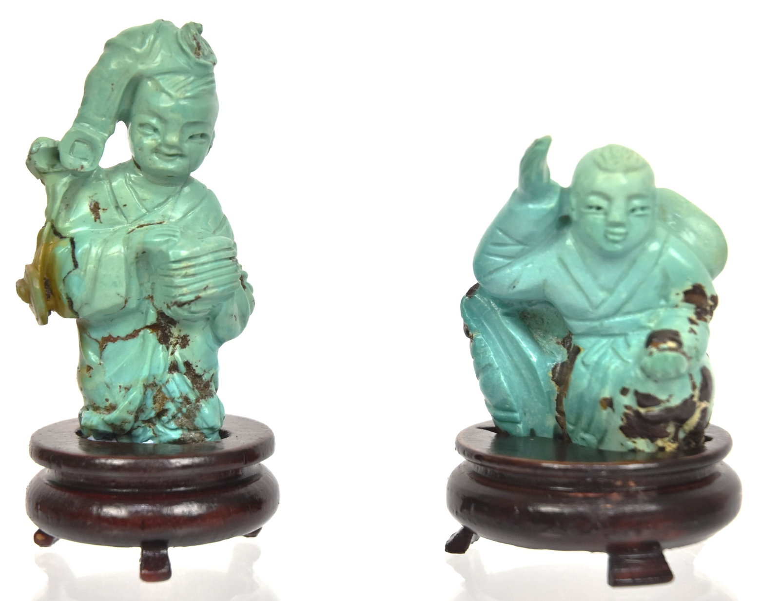 Two Chinese Turquoise Carvings: Both male figures on teak stands, 3" & 2 1/4" high. Condition Both Fine.