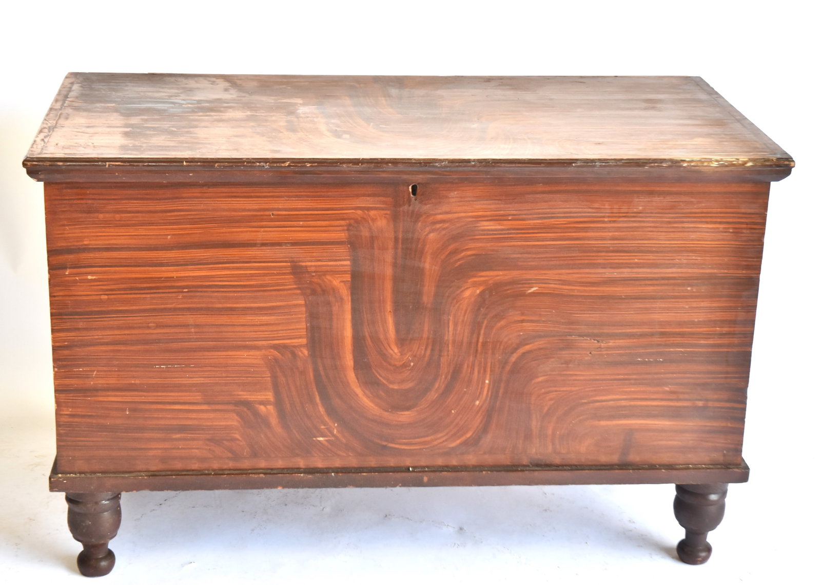 Early Grain Painted Blanket Chest With Tulip Designs: Unusual, Circa 1835 Pennsylvania dovetailed pine blanket chest with painted tulip designs on front, sides and top, all on turned feet. 24" H x 38" W x 19" D. Light wear to top; otherwise good conditio