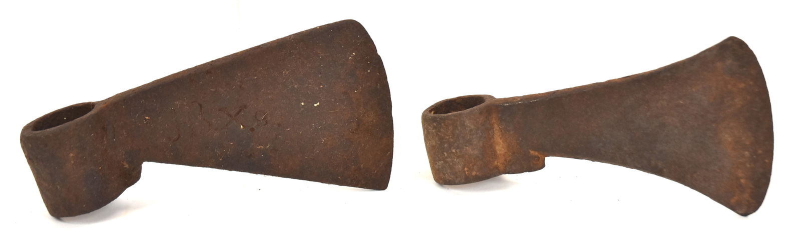 Two Wrought Iron Native American Hudson Bay Trade Axes: One marked, " H.B. X." Largest 4" H x 7 1/2" W. Both good condition.