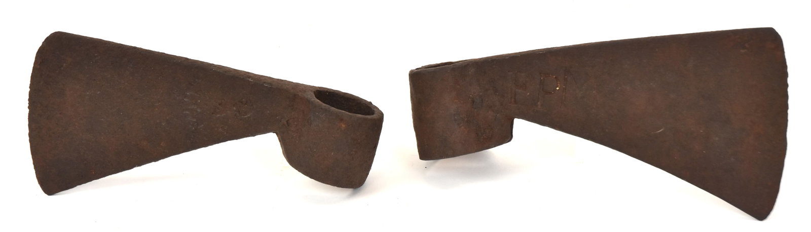 Two Native American Wrought Signed Iron Trade Axes: One marked, "F.P.M.", and one marked illegible. Largest 3 1/2" H x 7" W. Both good condition.
