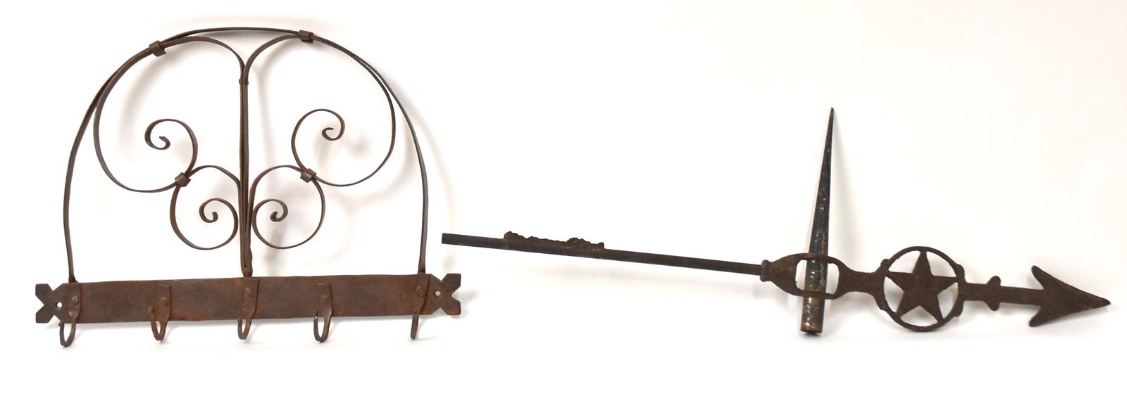 Iron Utensil Rack & Weathervane Directional: First iron utensil rack with five hoods. 11" H x 15" W. Second weathervane directional copper and iron with star. 8" H x 23" W. Both in good condition.