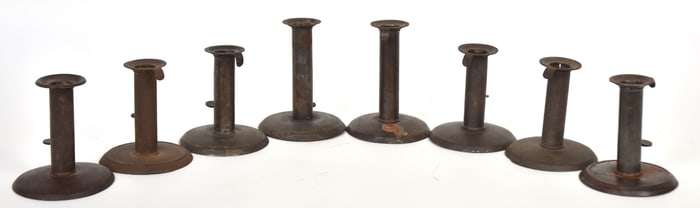 Eight Early Hog Scraper Candlesticks