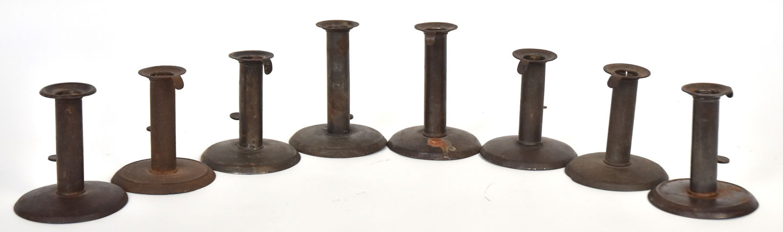 Eight Early Hog Scraper Candlesticks (1 of 8)