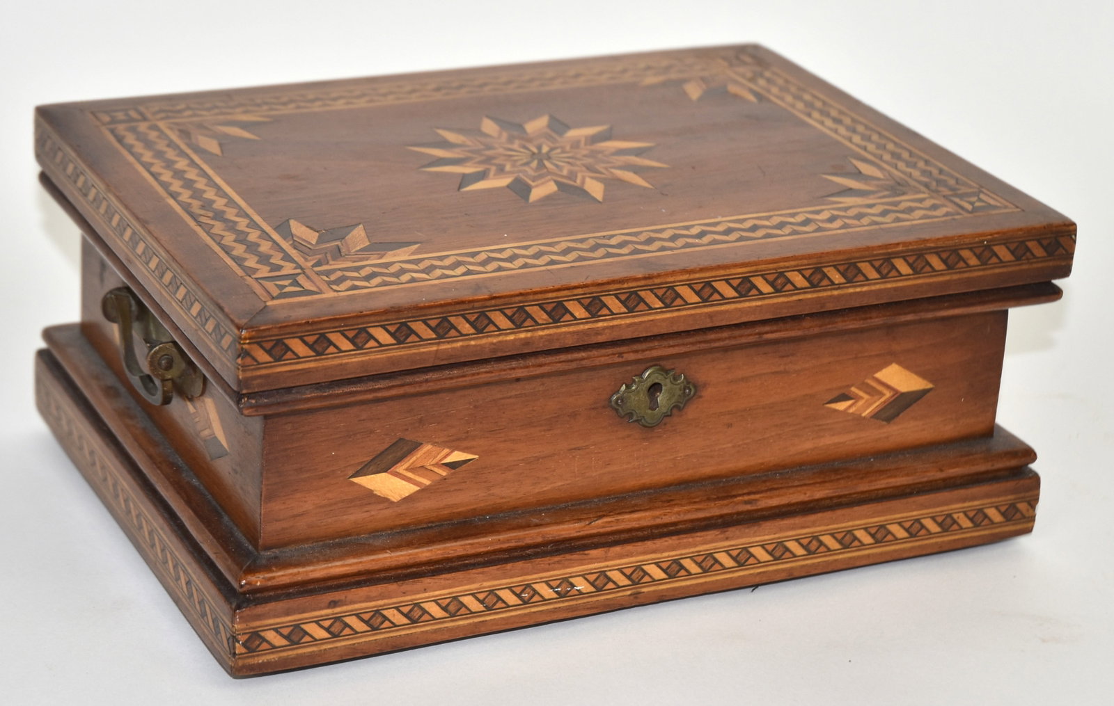 Fine Mahogany Inlaid Jewel Box: Wonderful star inlay with mirror and sliding box inside. 11"W x 7 3/4"D x 4 1/2"H.