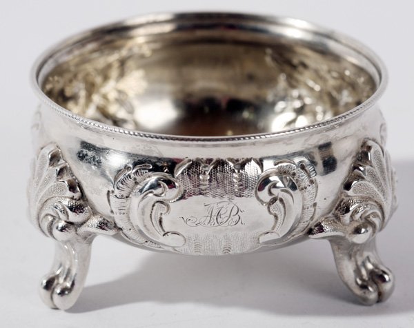 ALLCOCK & ALLEN, NEW YORK COIN SILVER SALT: Fancy coin silver salt with embossed florals. Hallmarked, Circa 1820. Good condition. 1 1/2" h x 2 1/2" w. 1.60 Troy oz.