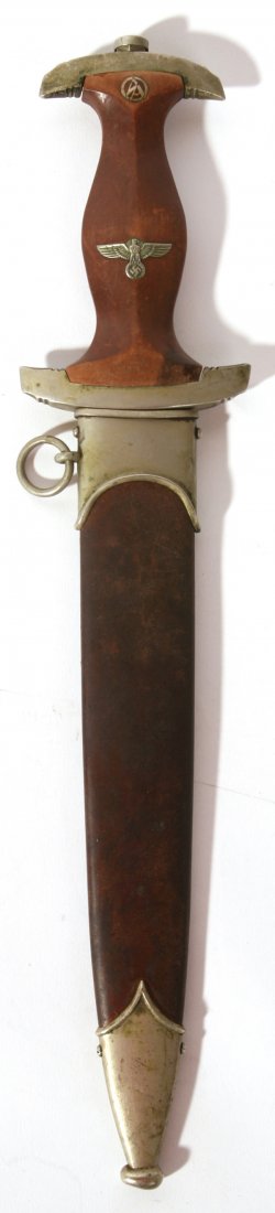 THIRD REICH SA DAGGER & SHEATH: Storm troopers or brown shirts dagger with wood grip inset with eagle and enameled "SA' symbol, nickel guard, pommel and capstand nut. Original steel scabbard with nickel drag and throat with carrying