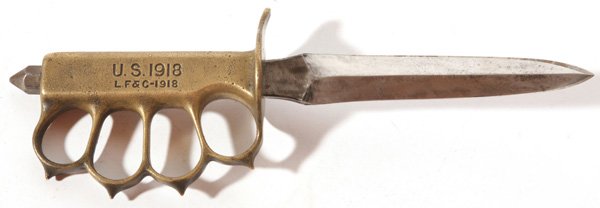 U.S. ARMY LF&C TRENCH KNIFE: With brass knuckle bow grip. Light wear, otherwise fine condition. 11 1/4" long.