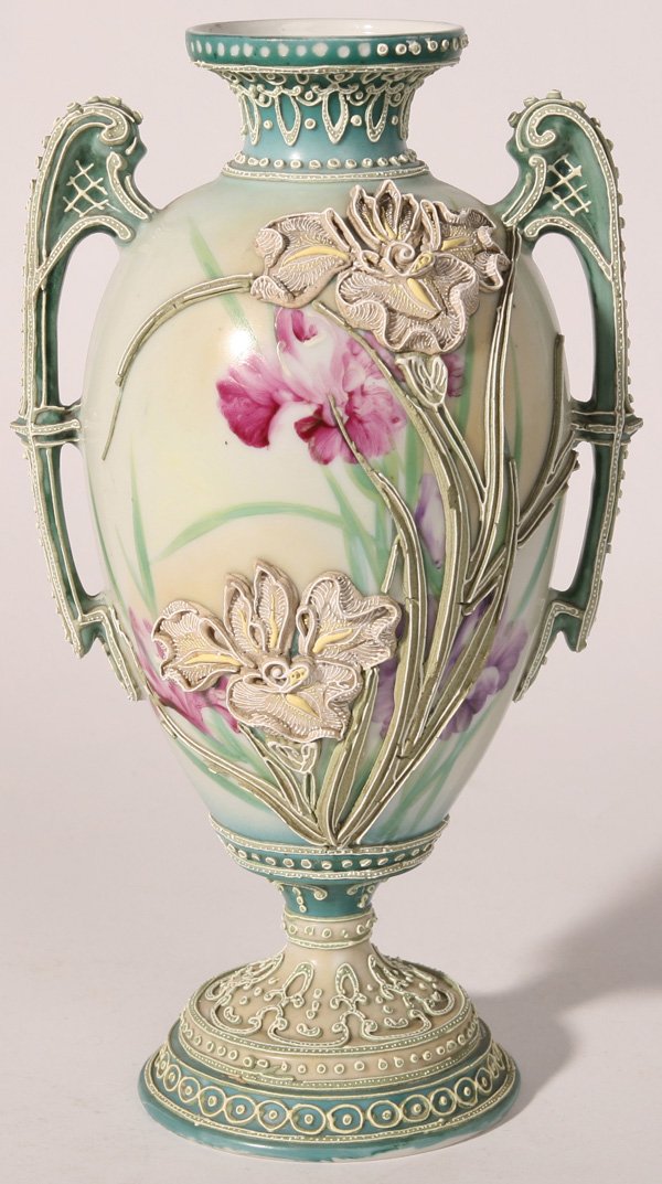 GREAT NIPPON MORIAGE PEDESTALED VASE: Lovely double handled Nippon vase with pedestal base and floral moriage over hand painted florals. A few tiny beads missing, otherwise excellent condition. Unsigned. 10 1/4" h.