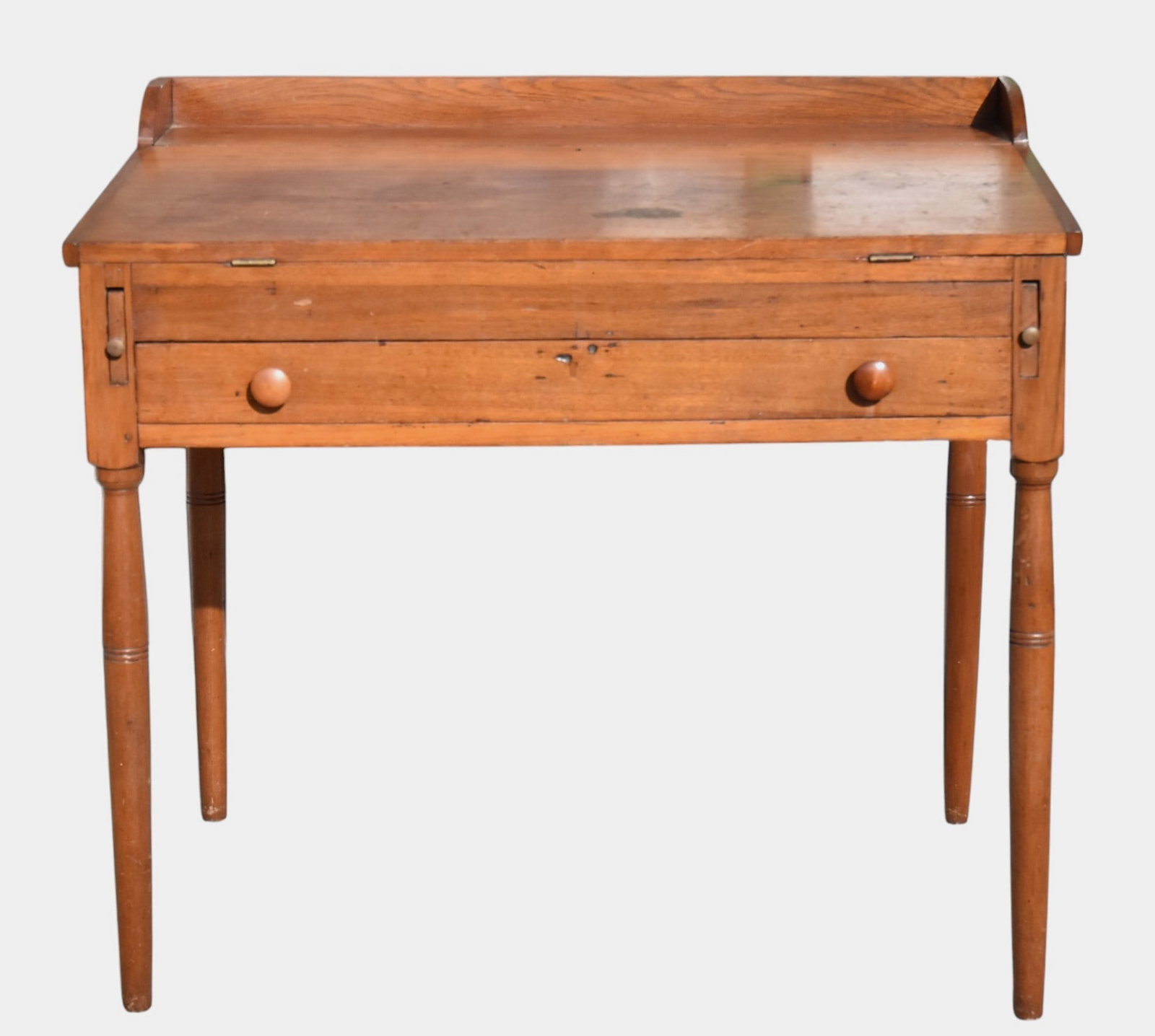 Shaker Desk: With gallery top, with pull down lid and open compartment inside. One drawer with turn shaker legs. 34" H. x 37" w. x 24" d. Older refinish. Good Condition.