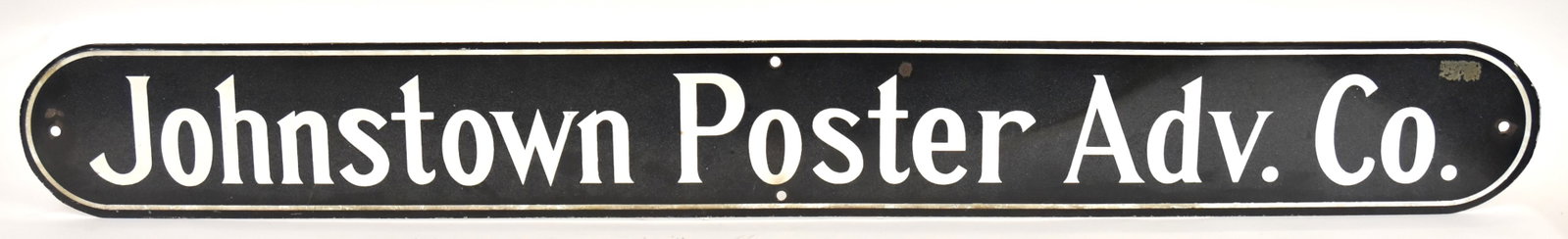 Porcelain Johnstown Poster Advertising Co. Sign: 5"H x 42"W. Good condition.